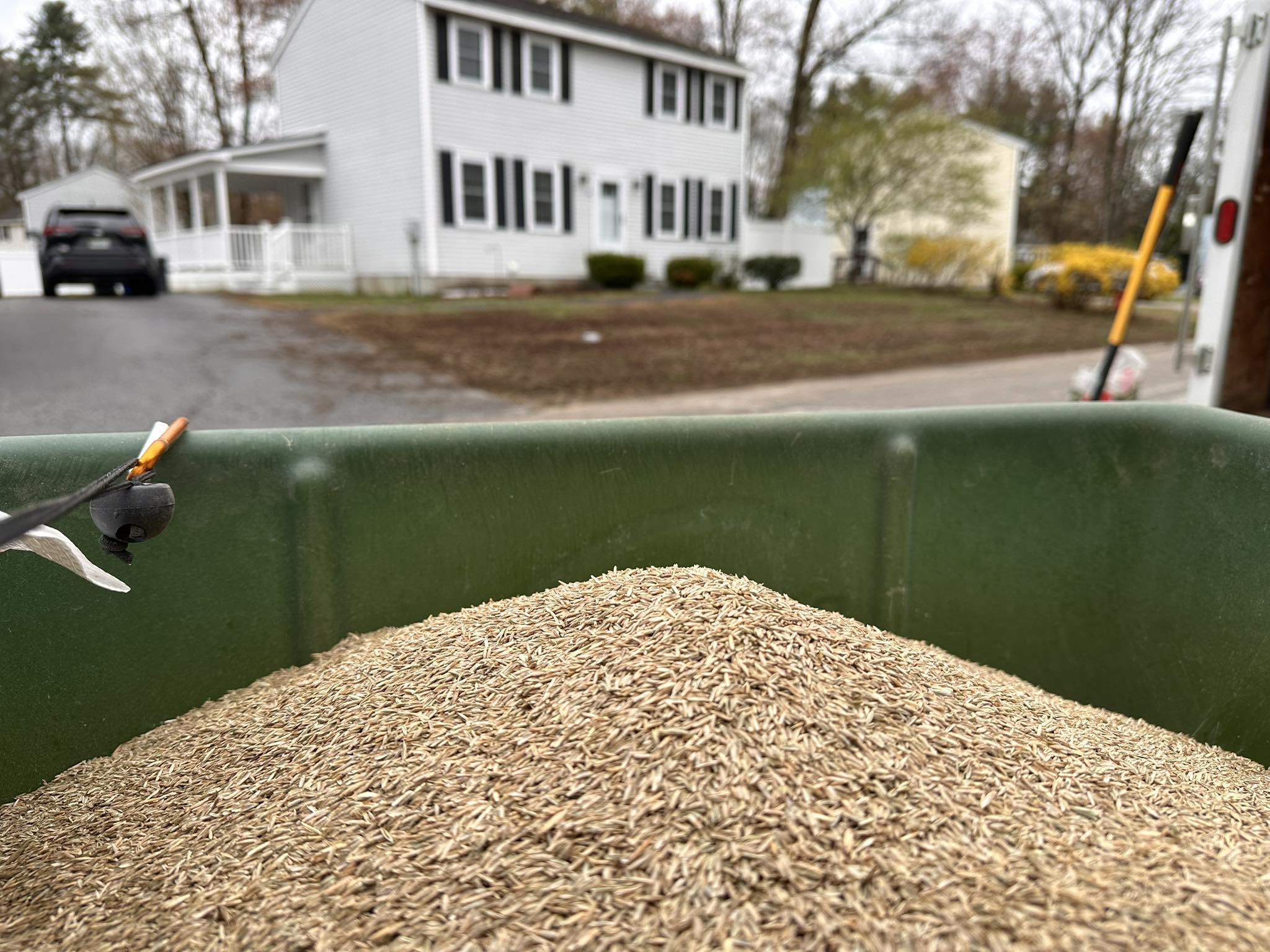 Licensed fertilizer application on a Concord NH lawn by Kyle Poirier